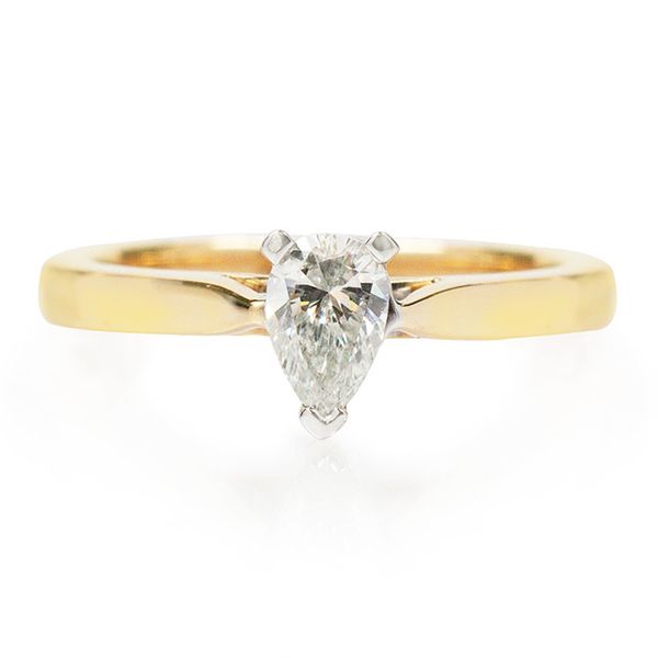 Solitaire pear cut sales engagement rings